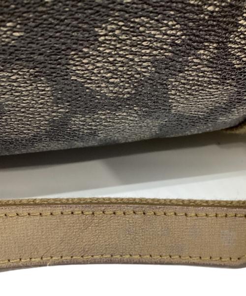 Yves Saint Laurent（イヴサンローラン）Yves Saint Laurent (イヴサンローラン) ジラフ柄 PVCボストンバッグ ベージュの古着・服飾アイテム