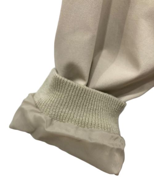 IZOD LACOSTE（アイゾッド ラコステ）IZOD LACOSTE (アイゾッド ラコステ) スイングトップ ベージュ サイズ:Lの古着・服飾アイテム