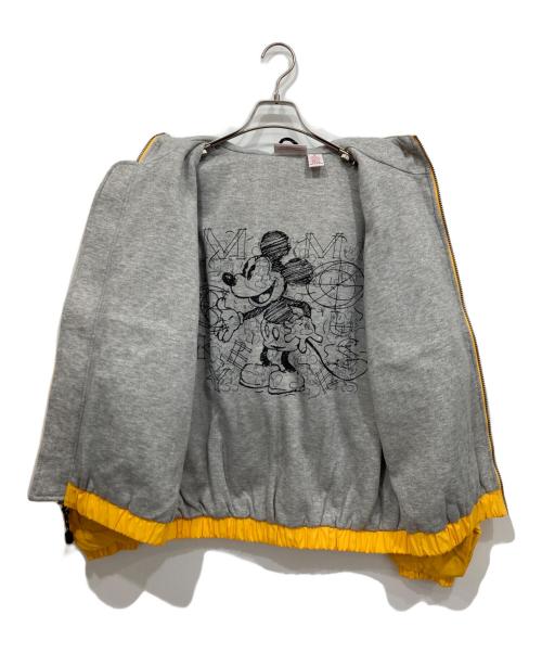 DISNEY（ディズニー）DISNEY (ディズニー) ナイロンフーデッドジャケット イエロー サイズ:Sの古着・服飾アイテム