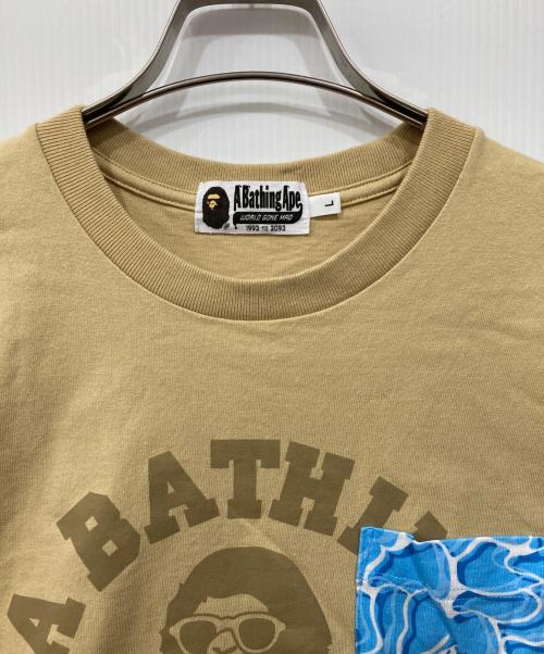 A BATHING APE（ア ベイシング エイプ）A BATHING APE (ア ベイシング エイプ) ロゴTシャツ ベージュ サイズ:Lの古着・服飾アイテム