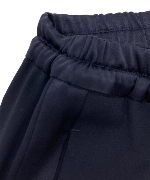 L'UNE（リュンヌ）L'UNE (リュンヌ) バックサテンセミフレアパンツ ネイビー サイズ:38の古着・服飾アイテム