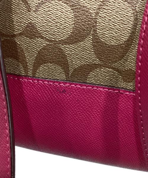 COACH（コーチ）COACH (コーチ) シグネチャーバックパック ブラウン×ショッキングピンクの古着・服飾アイテム