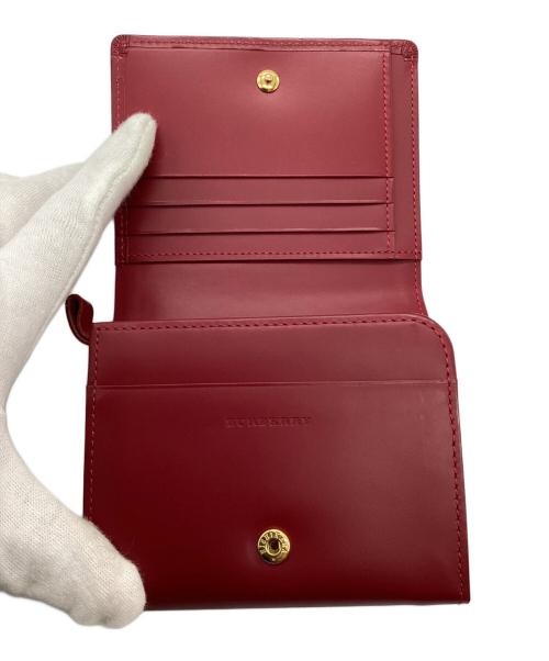 BURBERRY（バーバリー）BURBERRY (バーバリー) 2つ折り財布 レッドの古着・服飾アイテム