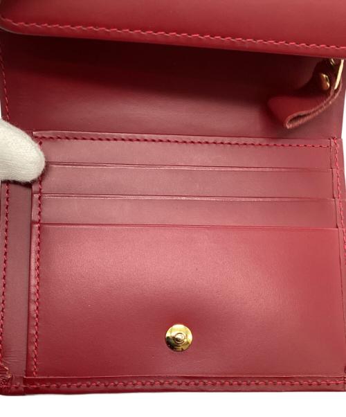 BURBERRY（バーバリー）BURBERRY (バーバリー) 2つ折り財布 レッドの古着・服飾アイテム