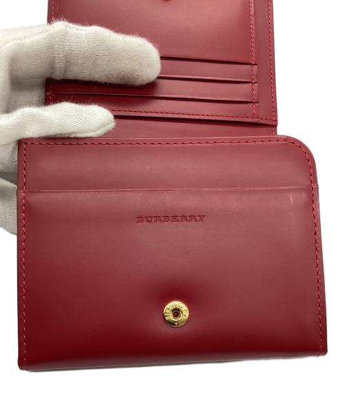 BURBERRY（バーバリー）BURBERRY (バーバリー) 2つ折り財布 レッドの古着・服飾アイテム