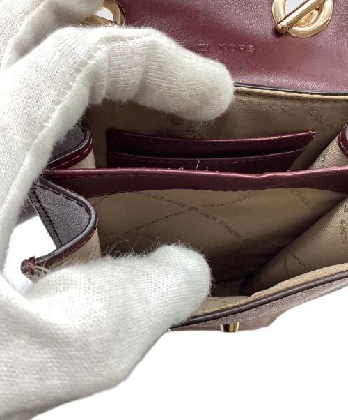 MICHAEL KORS（マイケル・コース）MICHAEL KORS (マイケル・コース) フォーンクロスボディスモールバッグ パープル×ピンクの古着・服飾アイテム