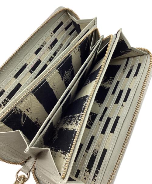 Vivienne Westwood（ヴィヴィアンウエストウッド）Vivienne Westwood (ヴィヴィアンウエストウッド) タッセルチャーム付き長財布 グレーの古着・服飾アイテム