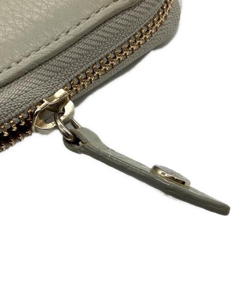 Vivienne Westwood（ヴィヴィアンウエストウッド）Vivienne Westwood (ヴィヴィアンウエストウッド) タッセルチャーム付き長財布 グレーの古着・服飾アイテム