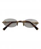 MIU MIUミュウミュウ）の古着「オーバル型 リムレスサングラス」｜ブラウン