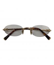 MIU MIU（ミュウミュウ）の古着「オーバル型 リムレスサングラス」｜ブラウン