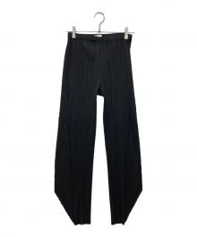 PLEATS PLEASE（プリーツプリーズ）の古着「裾変形プリーツパンツ」｜ブラック