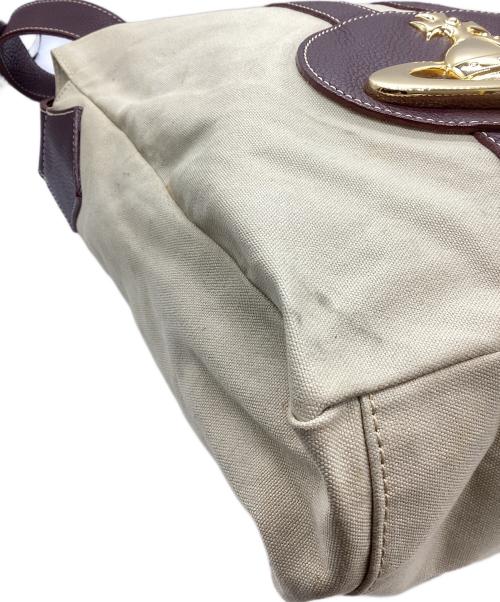 Vivienne Westwood（ヴィヴィアンウエストウッド）Vivienne Westwood (ヴィヴィアンウエストウッド) ビッグオーブ キャンバスショルダーバッグ ベージュの古着・服飾アイテム