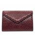 Cartier（カルティエ）の古着「パイソンカードケース」｜レッド