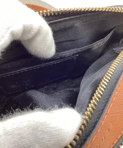 Marc by Marc Jacobs（マークバイマークジェイコブス）Marc by Marc Jacobs (マークバイマークジェイコブス) カメラショルダーバッグ オレンジ×ブラックの古着・服飾アイテム