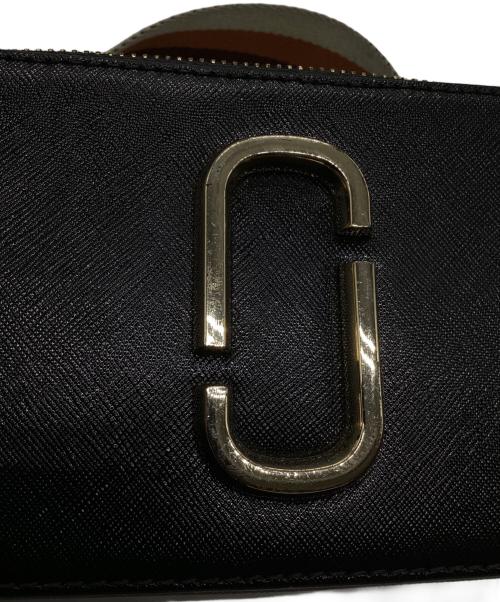 Marc by Marc Jacobs（マークバイマークジェイコブス）Marc by Marc Jacobs (マークバイマークジェイコブス) カメラショルダーバッグ オレンジ×ブラックの古着・服飾アイテム