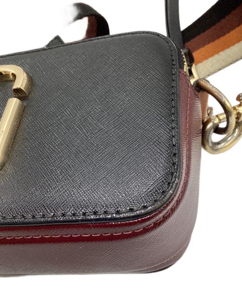 Marc by Marc Jacobs（マークバイマークジェイコブス）Marc by Marc Jacobs (マークバイマークジェイコブス) カメラショルダーバッグ オレンジ×ブラックの古着・服飾アイテム