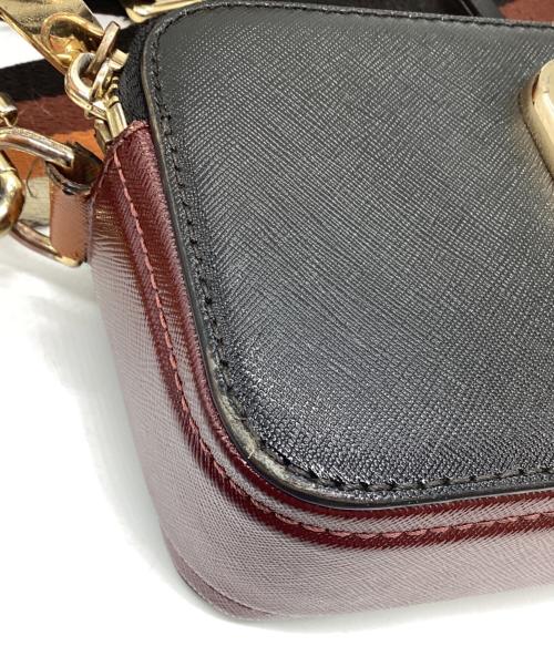 Marc by Marc Jacobs（マークバイマークジェイコブス）Marc by Marc Jacobs (マークバイマークジェイコブス) カメラショルダーバッグ オレンジ×ブラックの古着・服飾アイテム