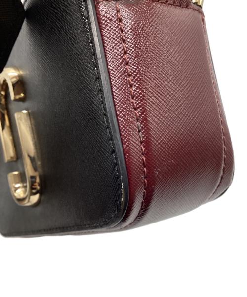 Marc by Marc Jacobs（マークバイマークジェイコブス）Marc by Marc Jacobs (マークバイマークジェイコブス) カメラショルダーバッグ オレンジ×ブラックの古着・服飾アイテム