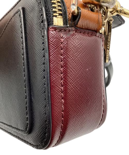 Marc by Marc Jacobs（マークバイマークジェイコブス）Marc by Marc Jacobs (マークバイマークジェイコブス) カメラショルダーバッグ オレンジ×ブラックの古着・服飾アイテム