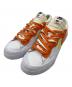 NIKE（ナイキ）の古着「ローカットスニーカー」｜ホワイト×オレンジ