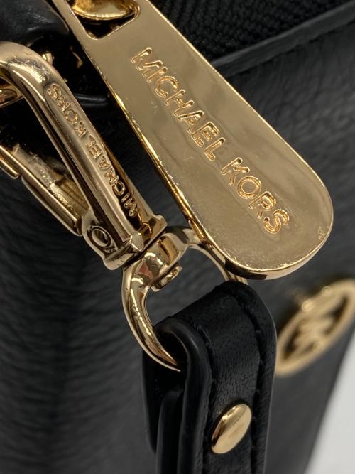 MICHAEL KORS（マイケルコース）MICHAEL KORS (マイケル・コース) ラウンドジップウォレット ブラックの古着・服飾アイテム