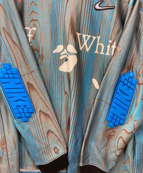 NIKE（ナイキ）NIKE (ナイキ) OFFWHITE (オフホワイト) NRG CL ジャージ S/S トップ ブルー サイズ:XLの古着・服飾アイテム