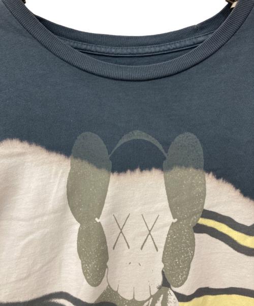 cactus jack（カクタス・ジャック）cactus jack (カクタス・ジャック) KAWS (カウズ) ロングスリーブカットソー グレー サイズ:XLの古着・服飾アイテム