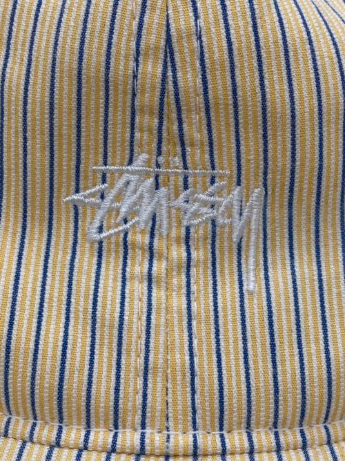 stussy（ステューシー）stussy (ステューシー) キャップ イエロー×ブルーの古着・服飾アイテム