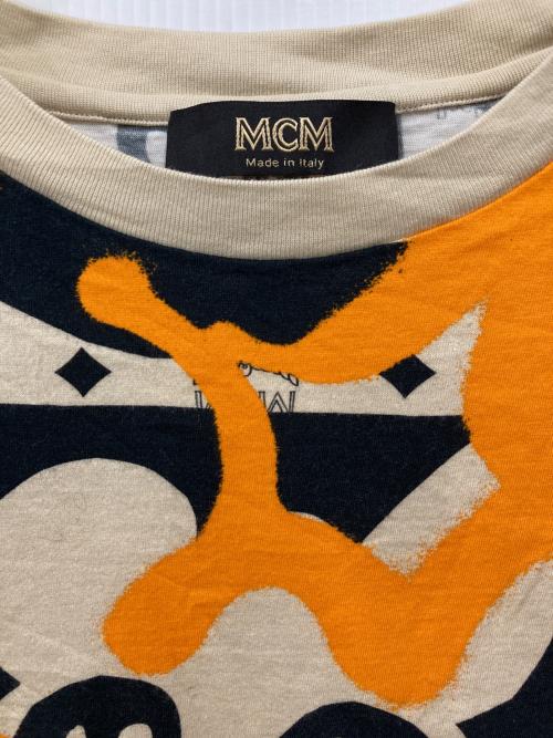 MCM（エムシーエム）MCM (エムシーエム) 総柄Tシャツ ベージュ×オレンジ サイズ:Mの古着・服飾アイテム