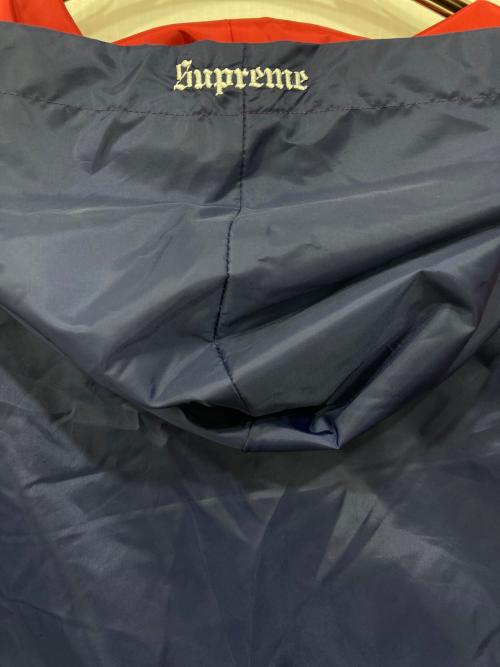 SUPREME（シュプリーム）Supreme (シュプリーム) フーデッドウォームアップオウルオーバー ネイビー×レッド サイズ:Lの古着・服飾アイテム