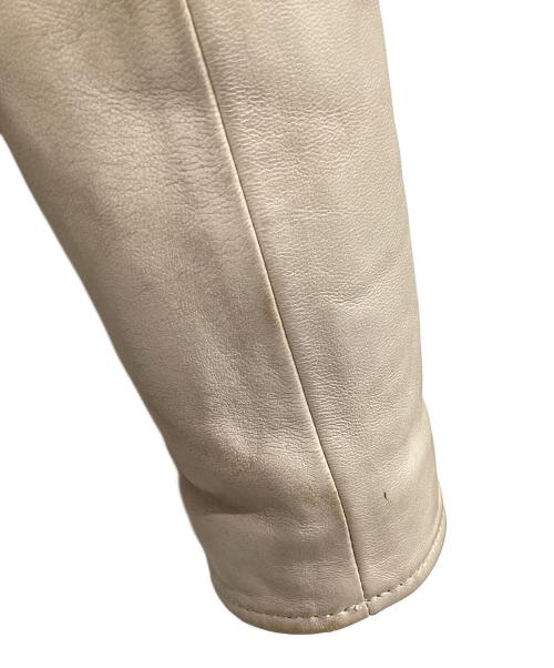 AVIREX（アヴィレックス）AVIREX (アヴィレックス) エイジド スタンド シングルライダースジャケット ベージュ サイズ:Lの古着・服飾アイテム