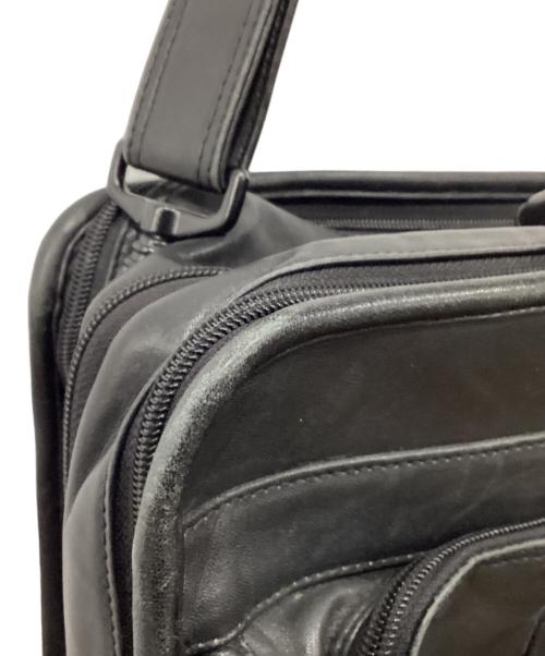 TUMI（トゥミ）TUMI (トゥミ) 拡張式レザービジネスバッグ ブラックの古着・服飾アイテム