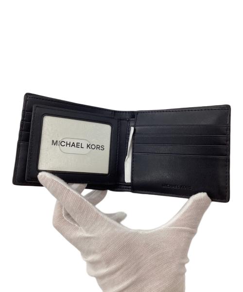 MICHAEL KORS（マイケルコース）MICHAEL KORS (マイケルコース) 2つ折り財布 ネイビー 未使用品の古着・服飾アイテム