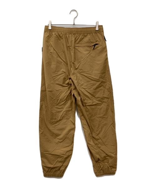 THE NORTH FACE（ザ ノース フェイス）THE NORTH FACE (ザ ノース フェイス) バーサタイルパンツ ブラウン サイズ:M 未使用品の古着・服飾アイテム