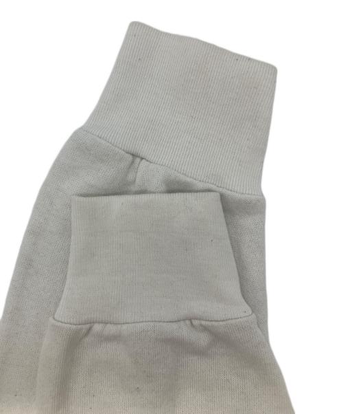 Champion（チャンピオン）Champion (チャンピオン) ラグランプルオーバーパーカー　LOYOLA CHICAGO　トリコタグ ホワイト サイズ:Lの古着・服飾アイテム