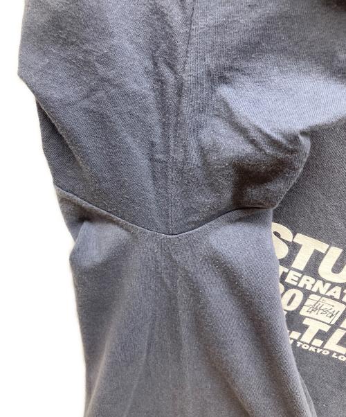 stussy（ステューシー）stussy (ステューシー) INTERNATIONAL N.Y.L.T.L.A. TEE ネイビー サイズ:XLの古着・服飾アイテム