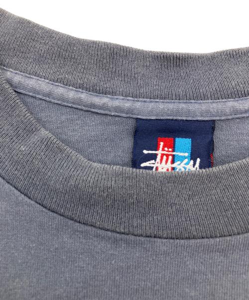 stussy（ステューシー）stussy (ステューシー) INTERNATIONAL N.Y.L.T.L.A. TEE ネイビー サイズ:XLの古着・服飾アイテム