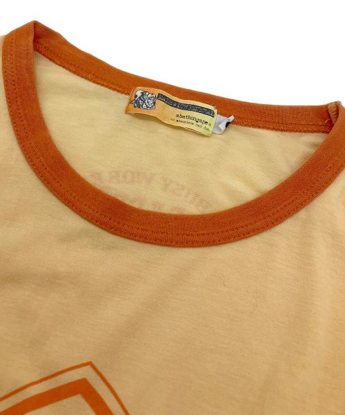 A BATHING APE（アベイシングエイプ）A BATHING APE (アベイシングエイプ) リンガーTシャツ オレンジ サイズ:Mの古着・服飾アイテム