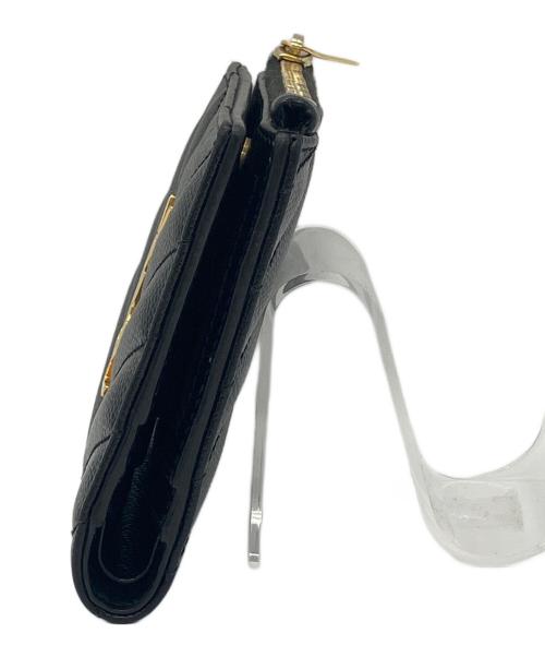 Saint Laurent Paris（サンローランパリ）Saint Laurent Paris (サンローランパリ) モノグラム バイフォールドウォレット　グレイン・ド・プードル エンボスレザー　コンパクトウォレット ブラックの古着・服飾アイテム