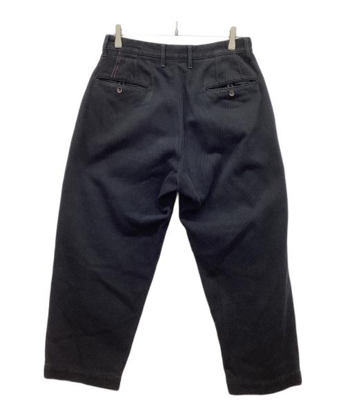anachronorm（アナクロノーム）anachronorm (アナクロノーム) STANDARD TUCK WIDE TROUSERS/スタンダードタックワイドトラウザーズ　チノパン　テーパードパンツ ブラック サイズ:SIZE 81cm (W32)の古着・服飾アイテム