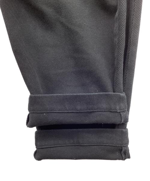 anachronorm（アナクロノーム）anachronorm (アナクロノーム) STANDARD TUCK WIDE TROUSERS/スタンダードタックワイドトラウザーズ　チノパン　テーパードパンツ ブラック サイズ:SIZE 81cm (W32)の古着・服飾アイテム