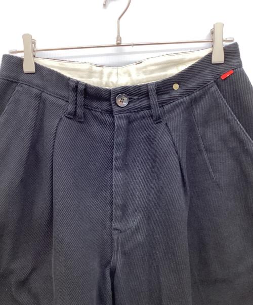 anachronorm（アナクロノーム）anachronorm (アナクロノーム) STANDARD TUCK WIDE TROUSERS/スタンダードタックワイドトラウザーズ　チノパン　テーパードパンツ ブラック サイズ:SIZE 81cm (W32)の古着・服飾アイテム