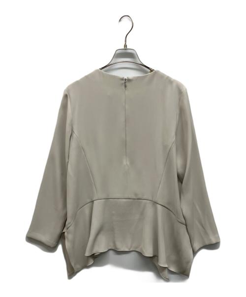 icB（アイシービー）icB (アイシービー) 洗えるライトダブルクロス ペプラムブラウス ベージュ サイズ:Sの古着・服飾アイテム