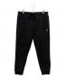 CarHartt（カーハート）の古着「american script jogging pant　アメリカン スクリプト ジョギング パンツ」｜ブラック