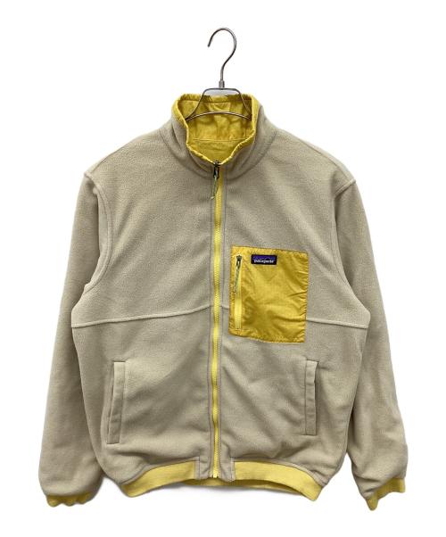 Patagonia（パタゴニア）Patagonia (パタゴニア) メンズ・リバーシブル・シェルド・マイクロディニ・ジャケット　フリースジャケット ベージュ×イエロー サイズ:Ｍの古着・服飾アイテム