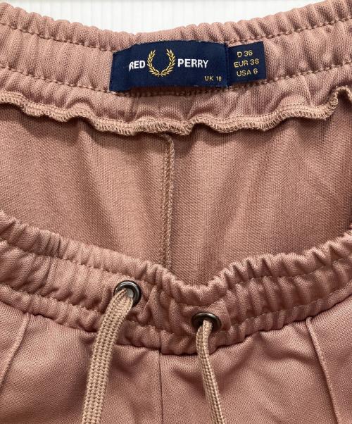 FRED PERRY（フレッドペリー）FRED PERRY (フレッドペリー) サイドラインワイドトラックパンツ ピンク サイズ:UK10の古着・服飾アイテム