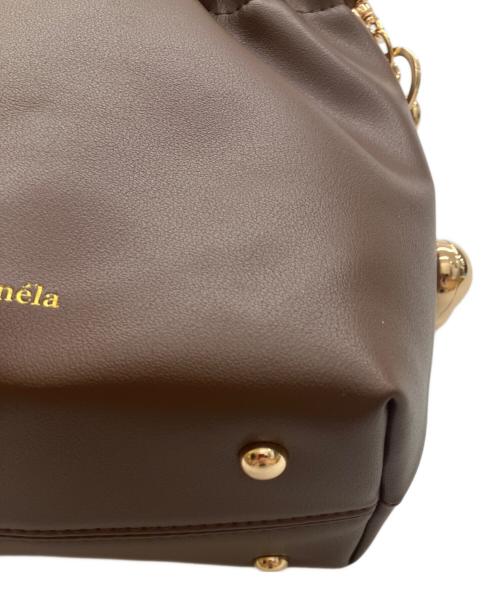 NUNELA（ヌネラ）NUNELA (ヌネラ) デザインハンドバッグ ブラウンの古着・服飾アイテム