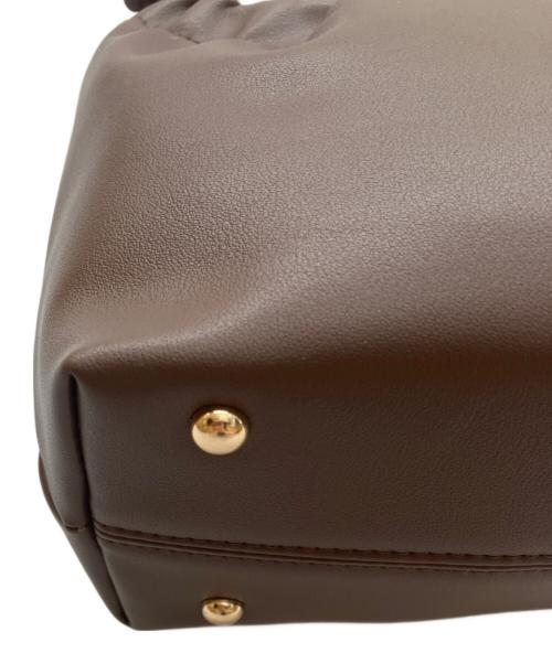 NUNELA（ヌネラ）NUNELA (ヌネラ) デザインハンドバッグ ブラウンの古着・服飾アイテム