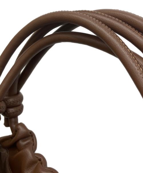 NUNELA（ヌネラ）NUNELA (ヌネラ) デザインハンドバッグ ブラウンの古着・服飾アイテム