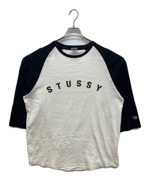 stussy（ステューシー）stussy (ステューシー) Champion (チャンピオン) ラグランカットソー　7分袖カットソー　ロゴプリントTシャツ ホワイト×ブラック サイズ:XLの古着・服飾アイテム